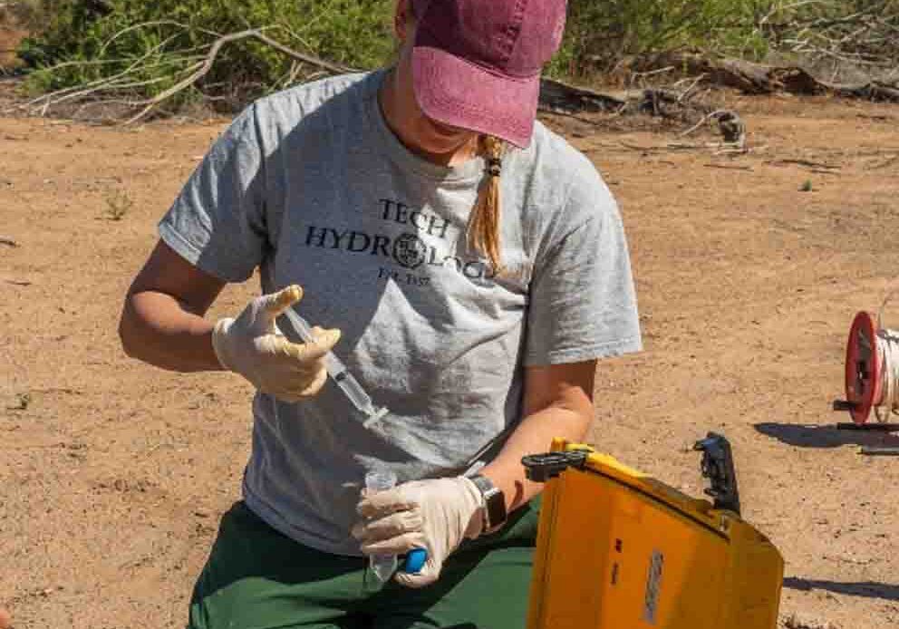 student working in the field